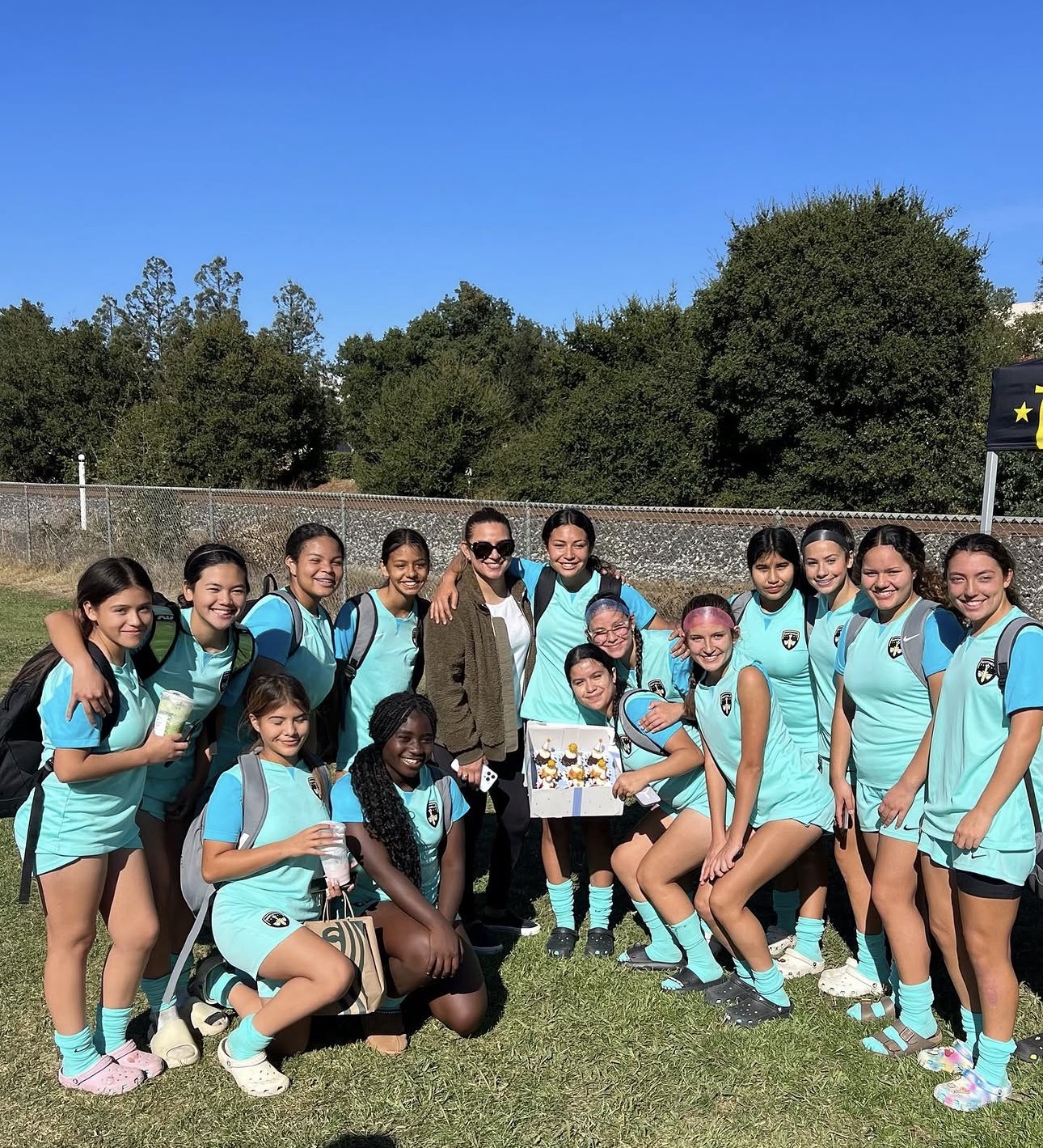 Sentinels teen girls soccer team celebrating a tournament win